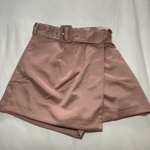 Satin rose gold DO+BE small skort with belt.